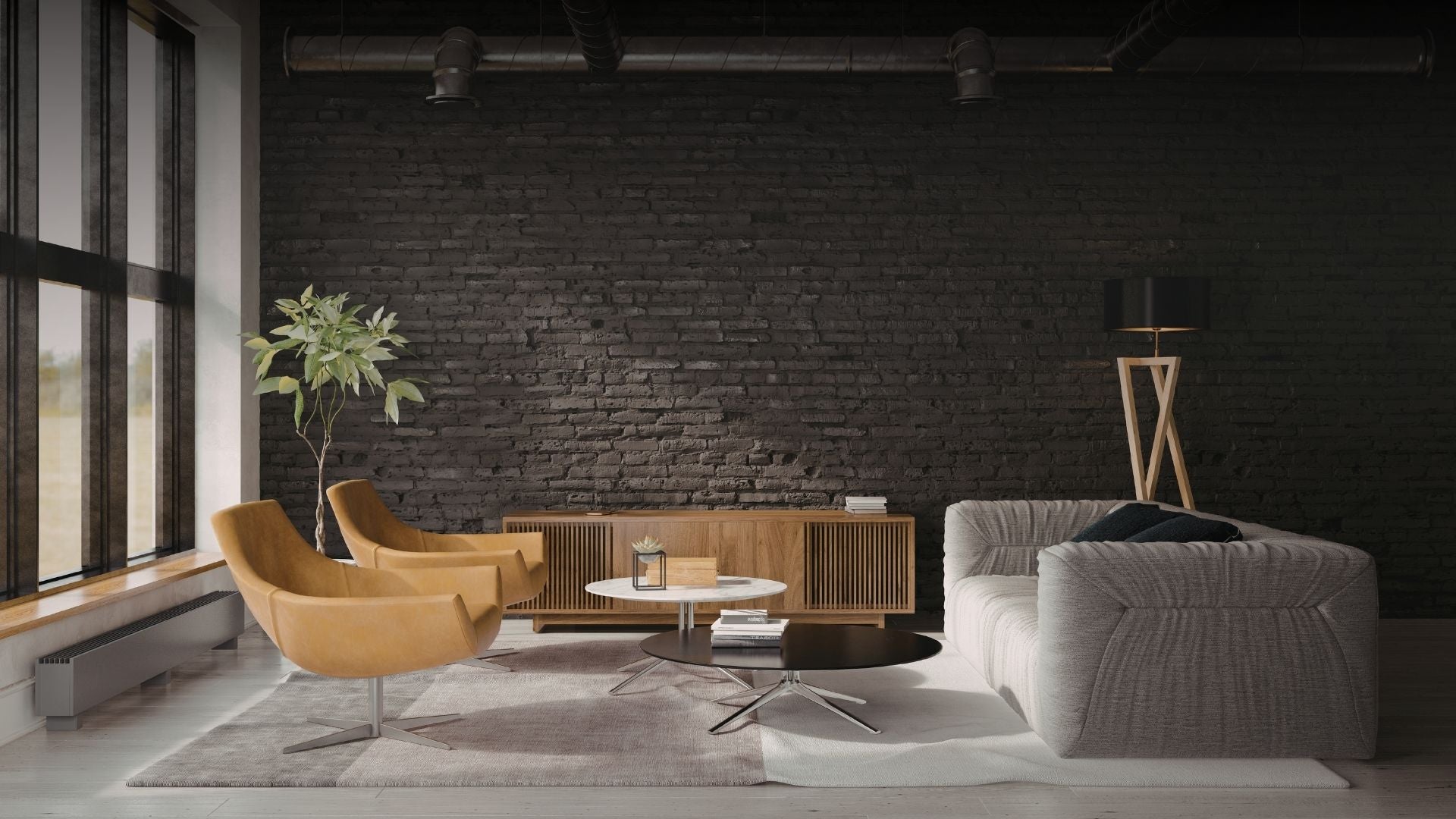 Modern living room with a dark brick wall, white sofa, and wooden furniture.